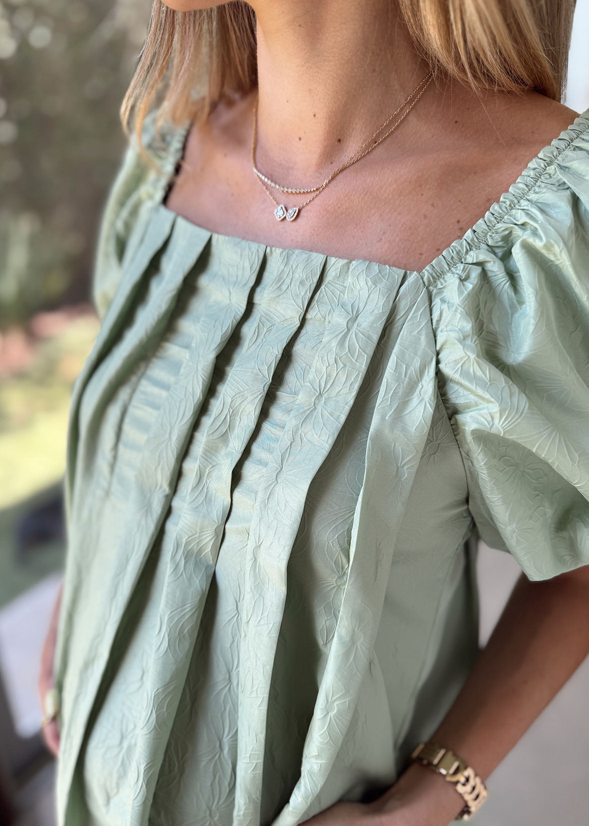 Vestido verde manga abullonada